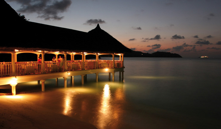 Domaine de la Reserve Seychelles night jetty lighting ocean view