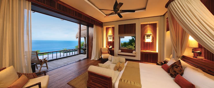 Maia Seychelles villa lounge area modern décor terrace overlooking ocean