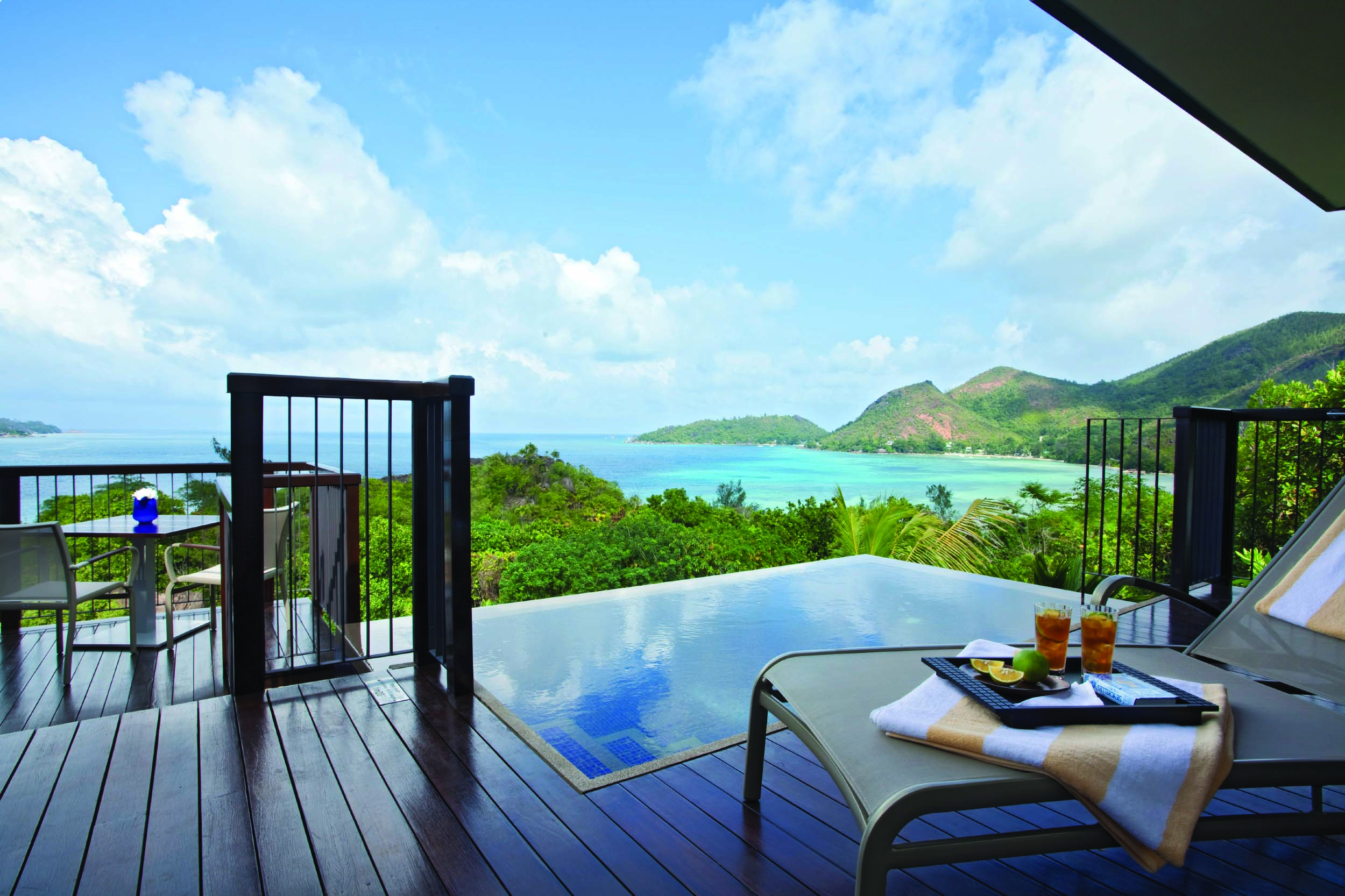 Raffles Praslin ocean view villa terrace with private plunge pool, sun lounger, views over the ocean