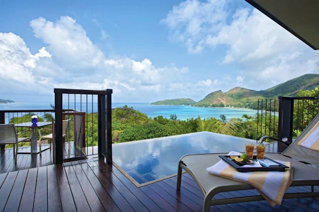 Raffles Praslin ocean view villa terrace with private plunge pool, sun lounger, views over the ocean