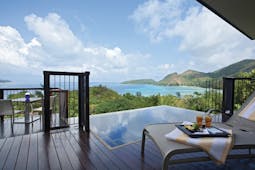 Raffles Praslin ocean view villa terrace with private plunge pool, sun lounger, views over the ocean