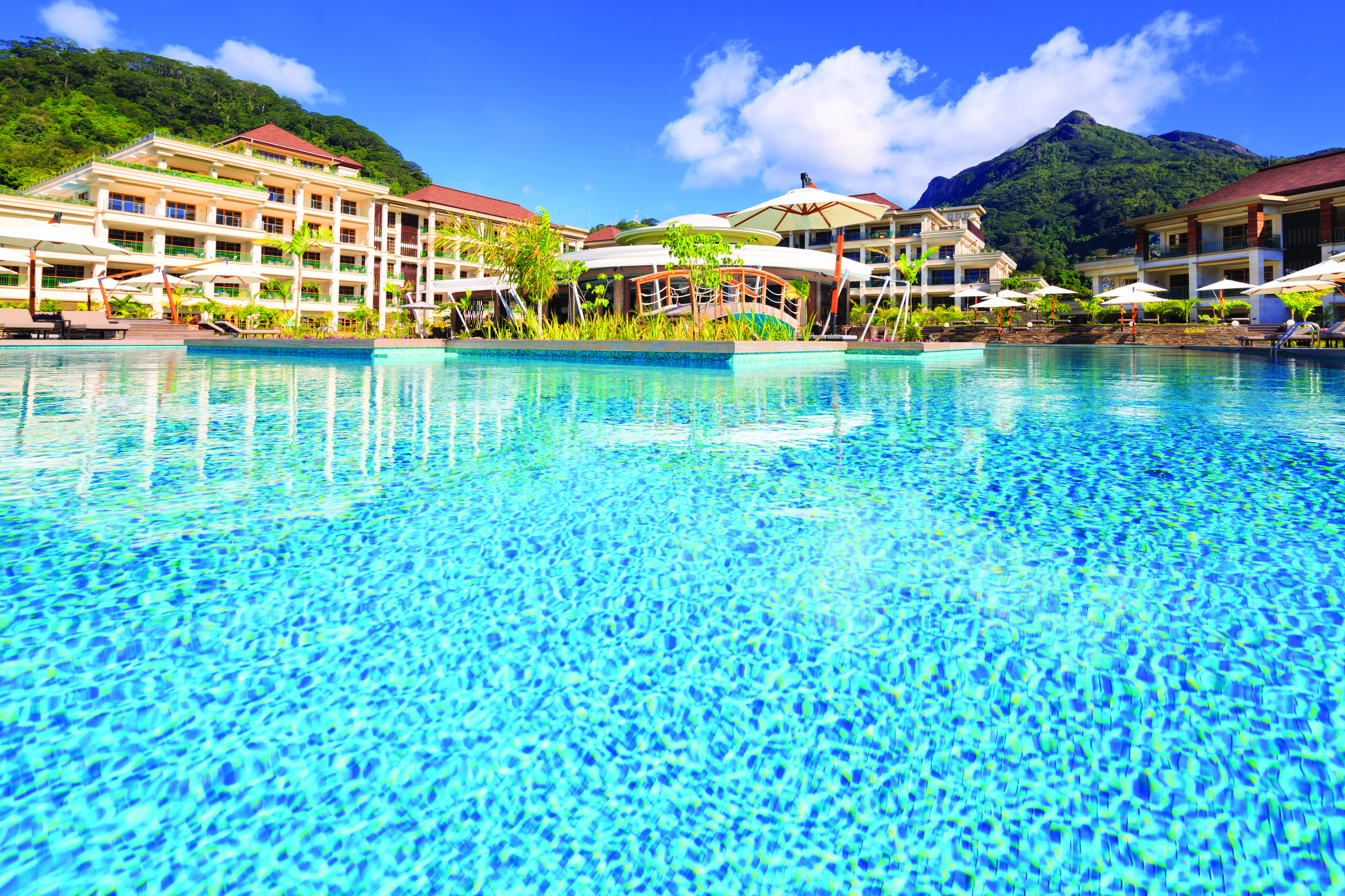 Savoy Seychelles pool, hotel building in background