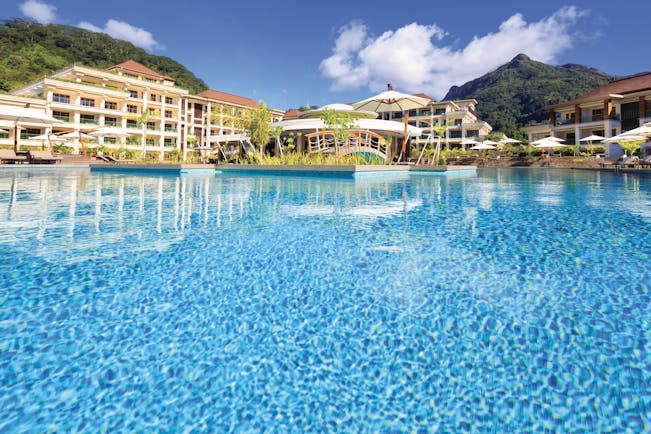 Savoy Seychelles pool, hotel building in background