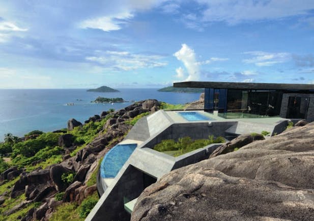 Six Senses Zil Pasyon residence, cliffside building with private pools and views out to sea