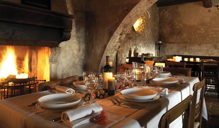 Sextantio Albergo Diffuso Abruzzo restaurant indoor dining area rustic décor