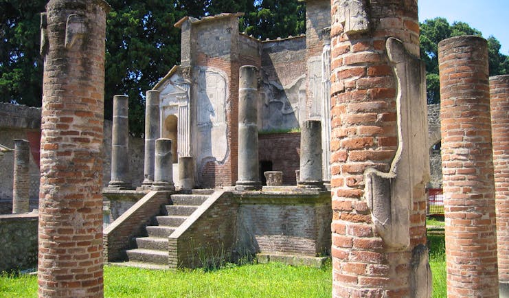Brick columns of remains of temple of Isis in Roman Pompeii