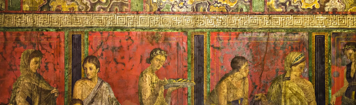 Roman frieze in reds representing the cult of Dionysus on wall of the Villa of the Mysteries in Pompeii