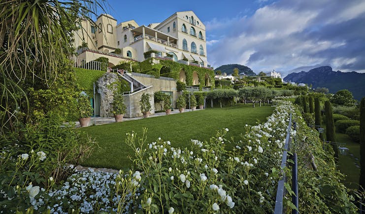 Hotel Caruso Amalfi Coast hotel exterior green lawns white flowers