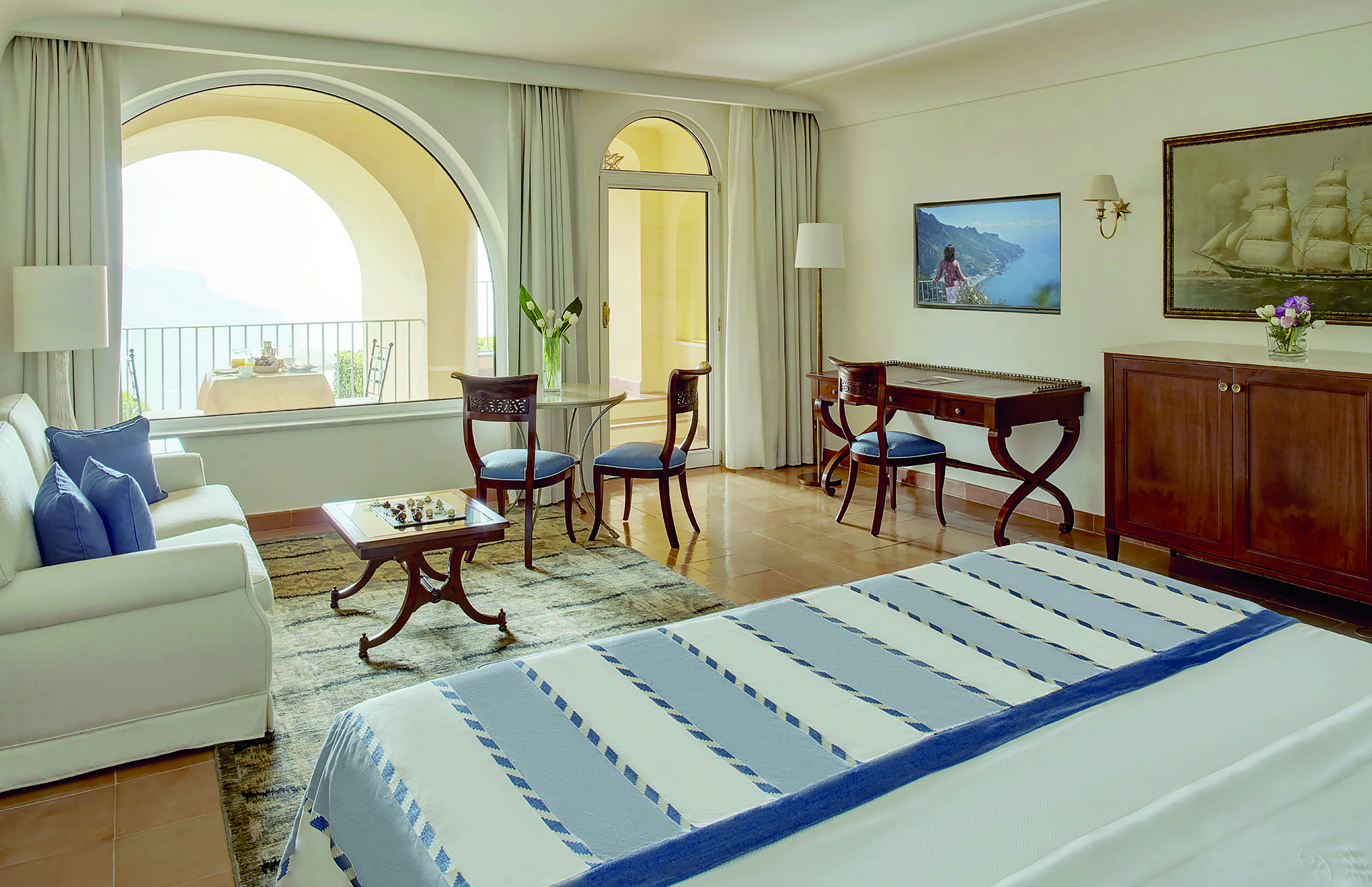 Hotel Caruso Amalfi Coast suite bed living area balcony with outdoor dining area