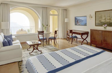 Hotel Caruso Amalfi Coast suite bed living area balcony with outdoor dining area