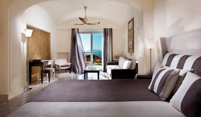 Capri Palace Hotel Amalfi Coast junior suite bed sofa terrace modern décor