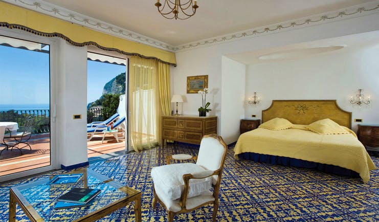 Casa Morgano Amalfi Coast deluxe junior suite bed chair ornate décor private terrace