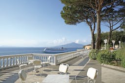 Grand Hotel Cocumella Amalfi Coast patio outdoor dining and seating area view of sea