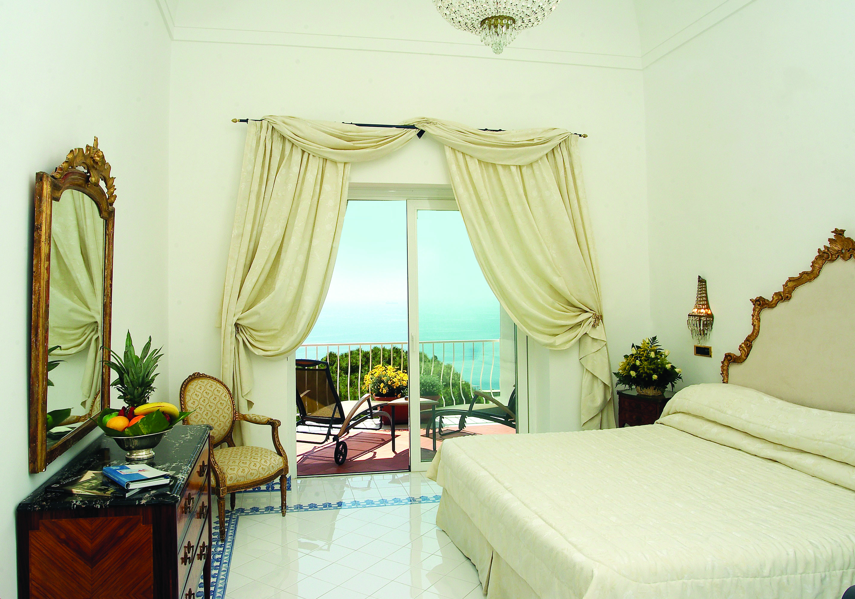 Hotel Quisisana Capri special deluxe room bed private terrace overlooking sea elegant décor