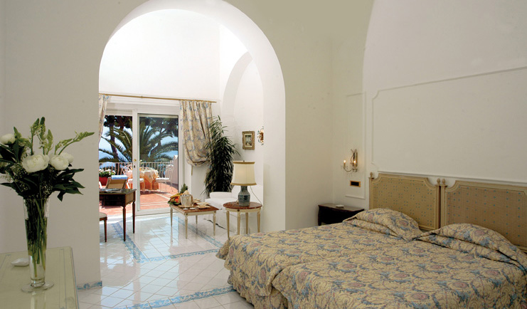 Hotel Quisisana Capri suite bed lounge area access to private terrace elegant décor
