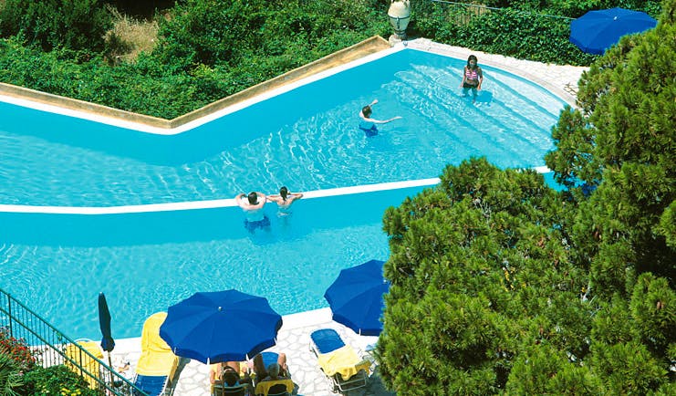 Caesar Augustus Amalfi Coast pool sun loungers umbrellas people playing in water