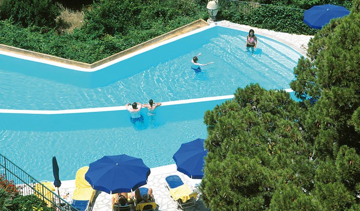 Caesar Augustus Amalfi Coast pool sun loungers umbrellas people playing in water