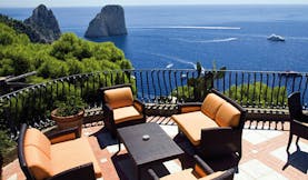 Hotel Luna Capri terrace outdoor seating area overlooking sea