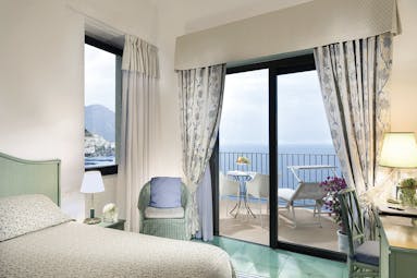 Hotel Miramalfi Amalfi Coast bedroom leading to balcony