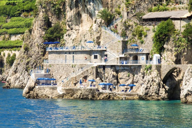 Hotel Miramalfi Amalfi Coast private beach terrace sun loungers and umbrellas