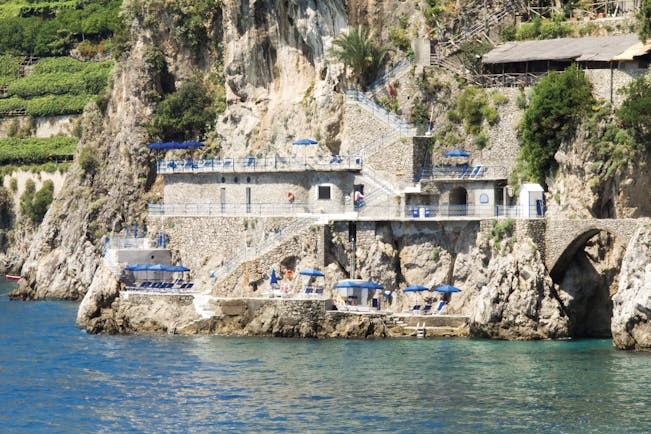 Hotel Miramalfi Amalfi Coast private beach terrace sun loungers and umbrellas