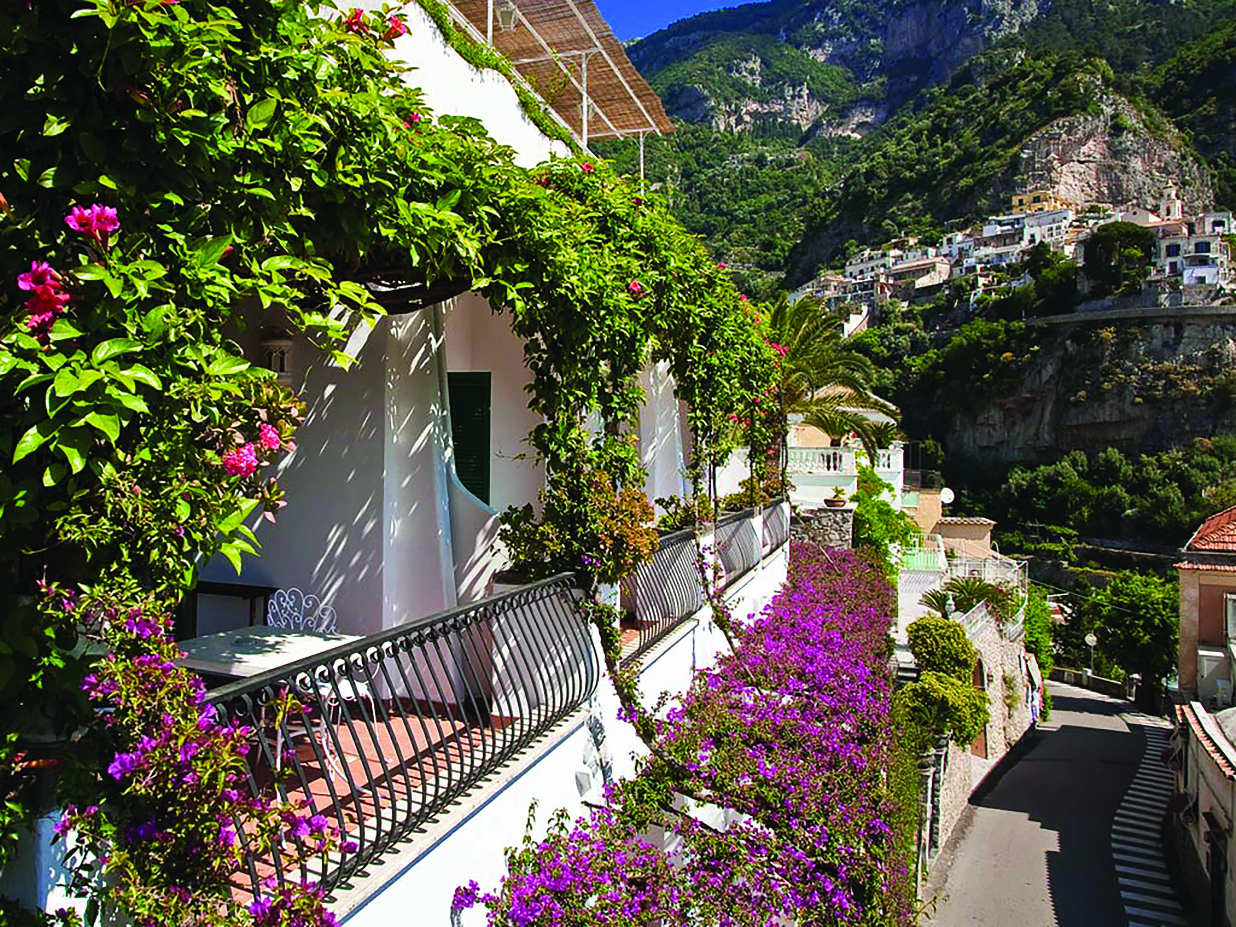 Hotel Poseidon Amalfi Coast balconies with vines growing around them