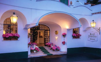 Hotel Poseidon Amalfi Coast entrance exterior flowers in window boxes and on stairs