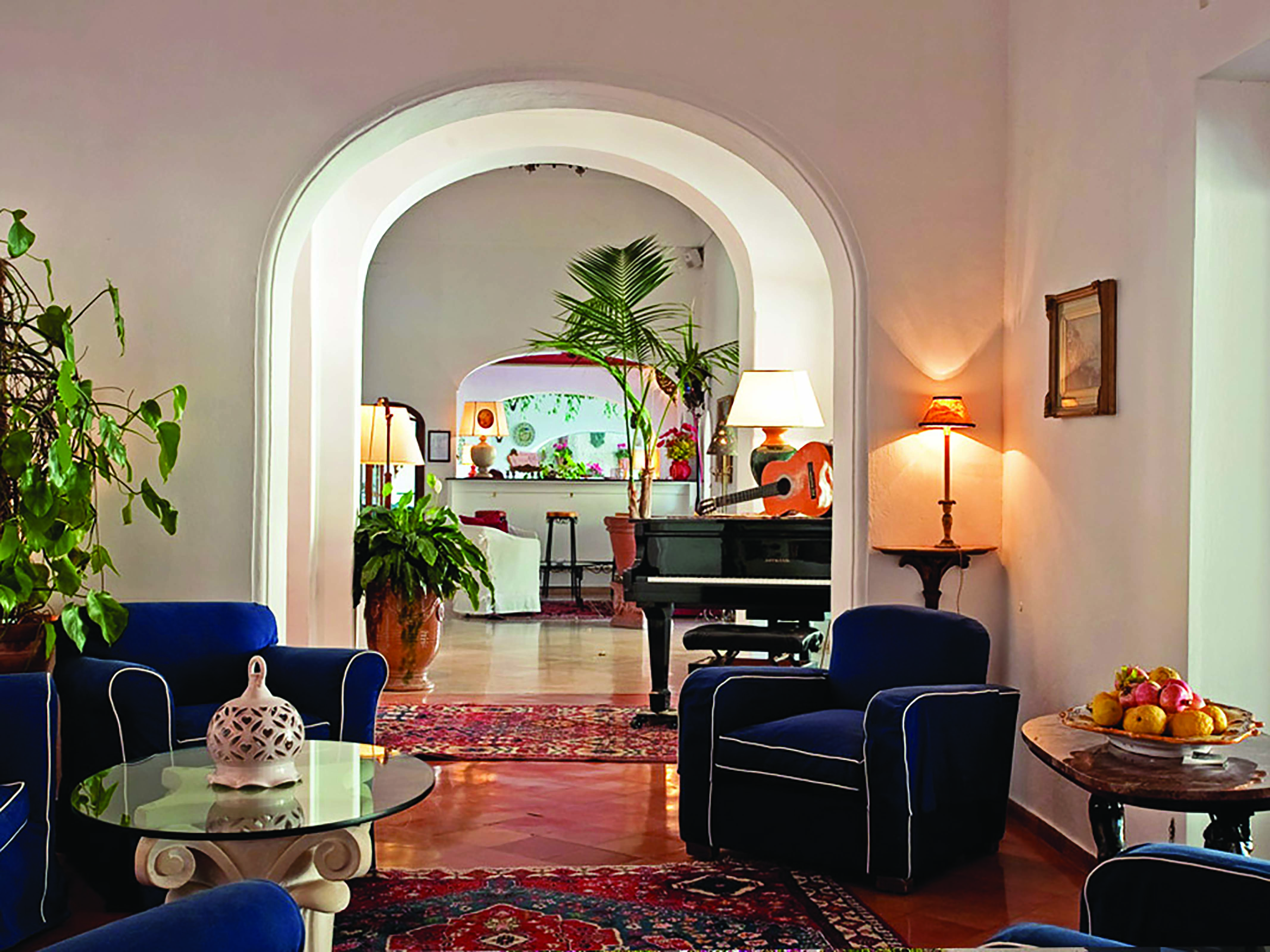 Hotel Poseidon Amalfi Coast indoor lounge bar indoor seating piano and bar