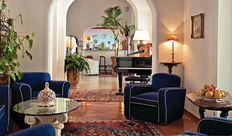 Hotel Poseidon Amalfi Coast indoor lounge bar indoor seating piano and bar