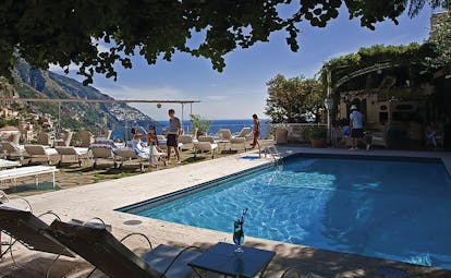 Hotel Poseidon Amalfi Coast pool terrace with sun loungers view of the sea