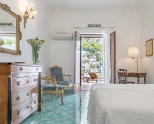 Hotel Poseidon Amalfi Coast sky room bedroom leading to balcony