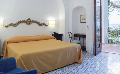 Hotel Poseidon Amalfi Coast bedroom leading to balcony