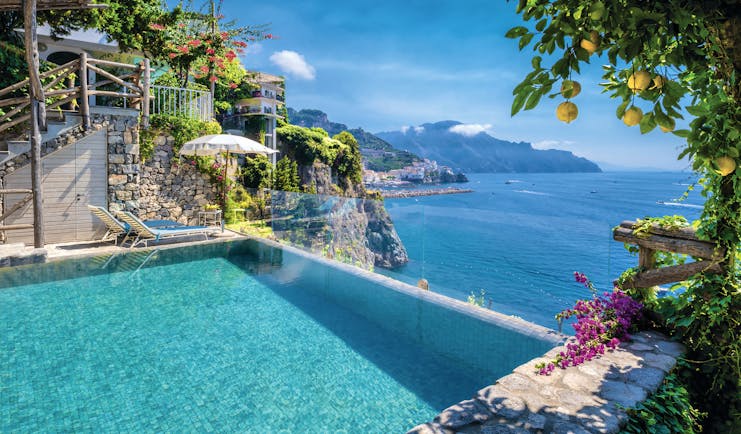 Hotel Santa Caterina Amalfi Coast infinity pool follia amalfitana suite overlooking sea