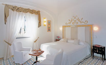 Hotel Santa Caterina Amalfi Coast standard room bed armchair