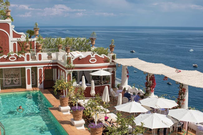 Le Sirenuse Amalfi Coast pool and dining terrace overlooking the ocean