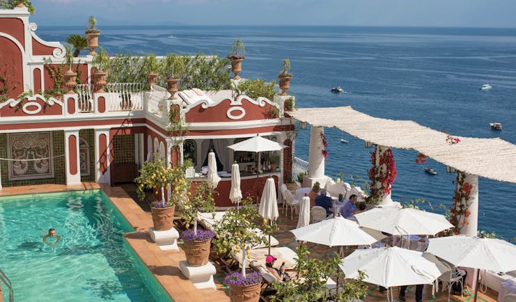 Le Sirenuse Amalfi Coast pool and dining terrace overlooking the ocean