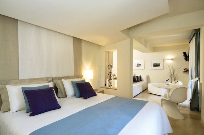 Mezzatorre Resort Amalfi Coast bed and living area chair sofa