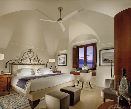 Monastero Santa Rosa Amalfi Coast deluxe room bed and bedroom furniture