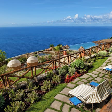 Monastero Santa Rosa Amalfi Coast infinity pool and gardens overlooking the sea