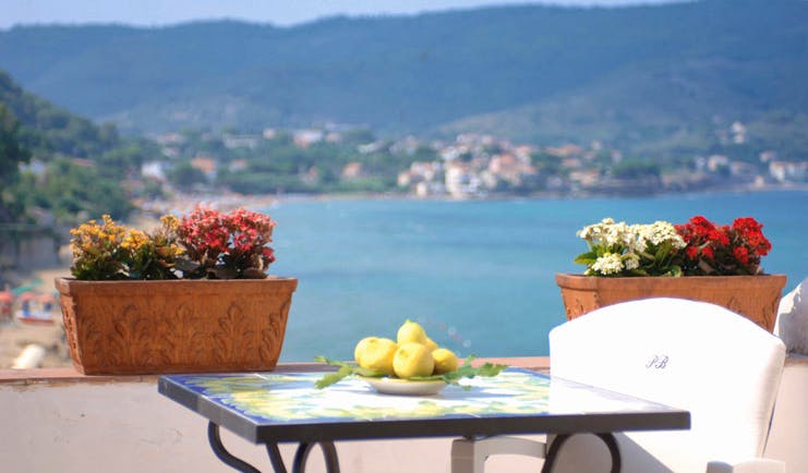 Palazzo Belmonte Amalfi Coast terrace outdoor seating overlooking sea bowl of lemons