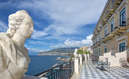 Bellevue Syrene Amalfi Coast lord astor terrace marble floor tiles outdoor seating roman style bust