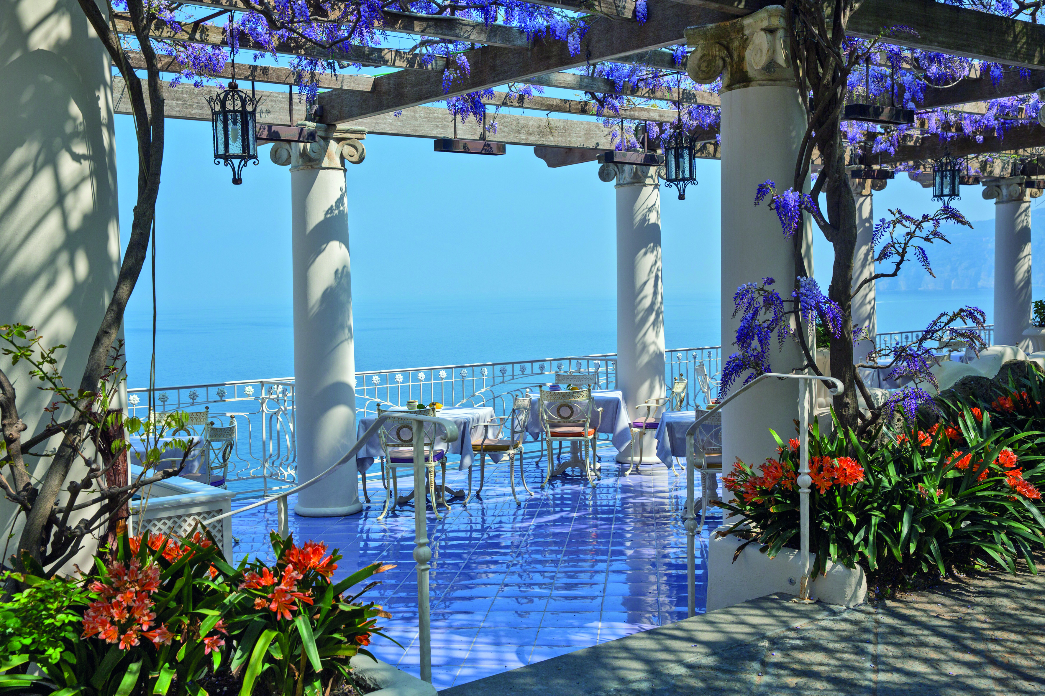 Bellevue Syrene Amalfi Coast pergola terrace outdoor dining overlooking the sea