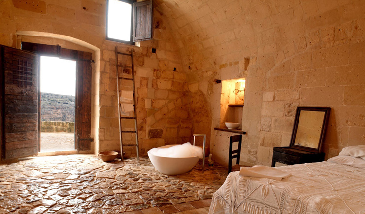 Sextantio Le Grotte Della Civita Basilicata cave guest room authentic architecture
