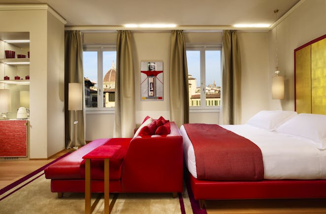 Grand Hotel Minerva Florence red and white bed of spacious junior suite