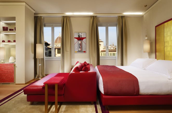 Grand Hotel Minerva Florence red and white bed of spacious junior suite