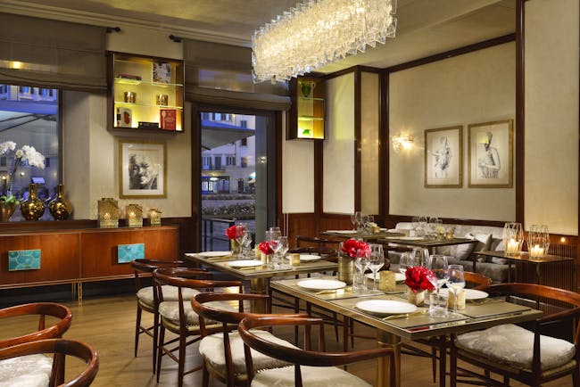 Grand Hotel Minerva Florence cosy restaurant with wooden chairs and panelled walls