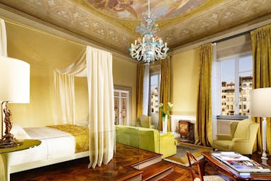 Grand Hotel Minerva Florence ornate suite in yellows and greens