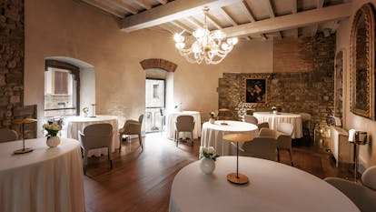 Restaurant with cobbled stone walls and wooden floors at the Brunelleschi