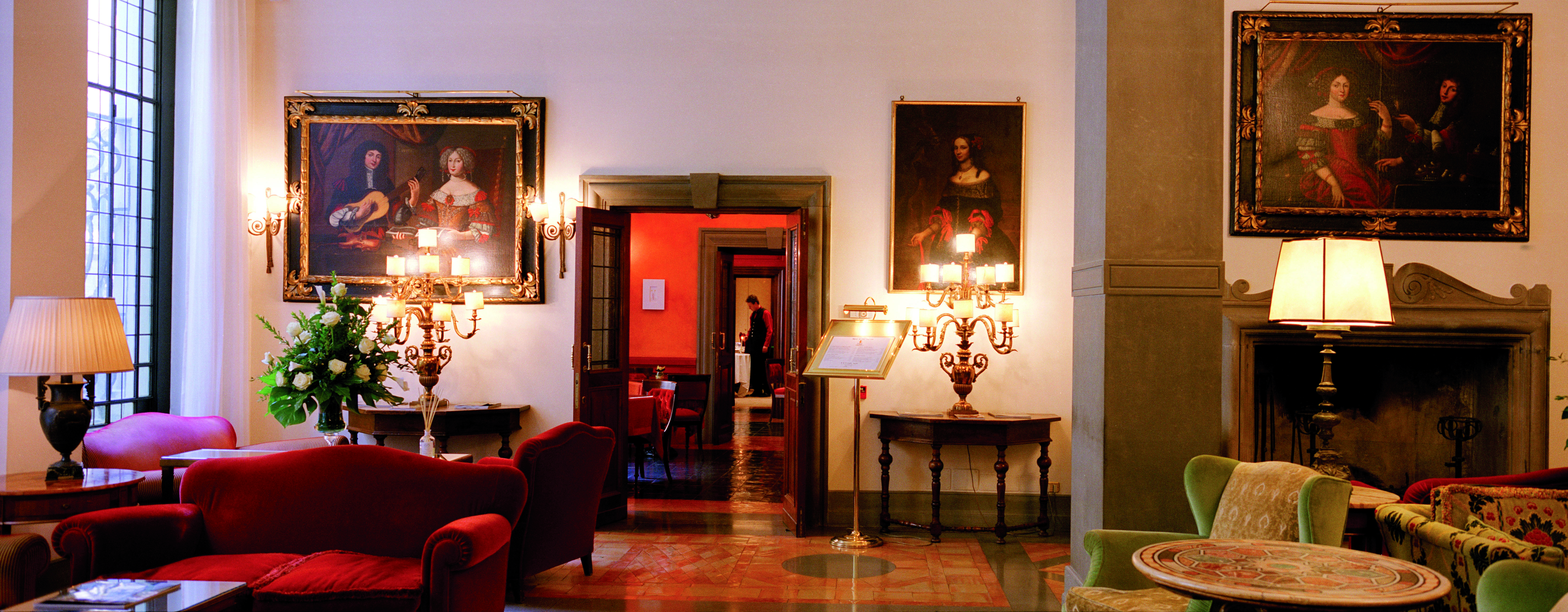 Helvetia and Bristol Florence lobby red sofas armchairs indoor seating area