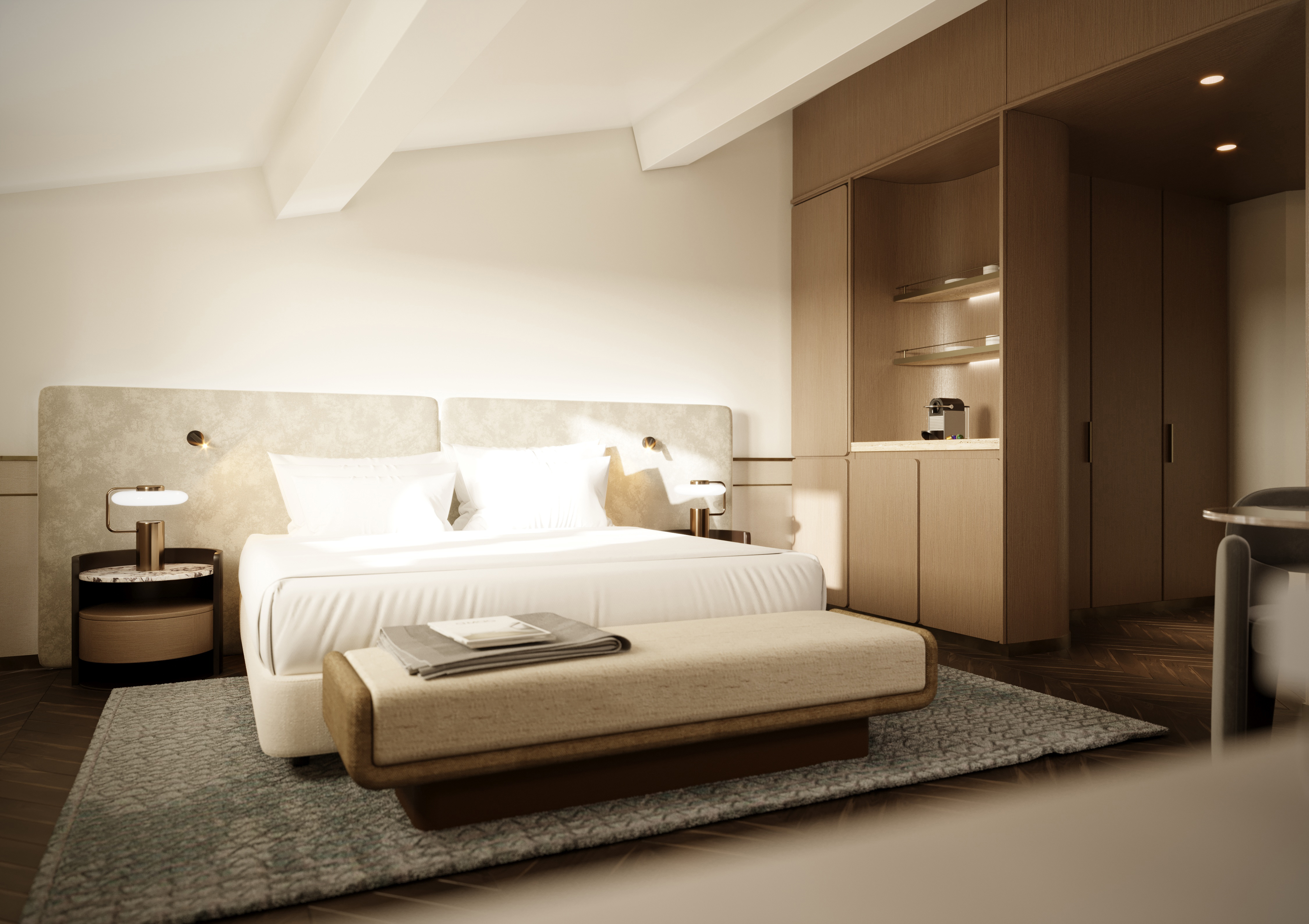 Palazzo Firenze Deluxe Room with modern, neutral design, including low double bed and plush headboard and sleek wooden wardrobe